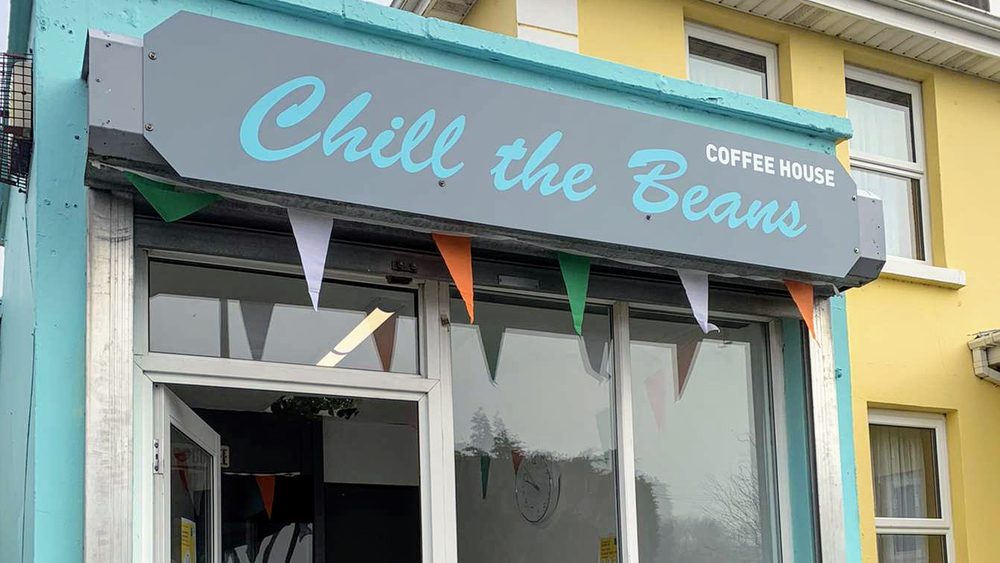 The Mungret shopfront with its teal Chill the Beans sign and bunting