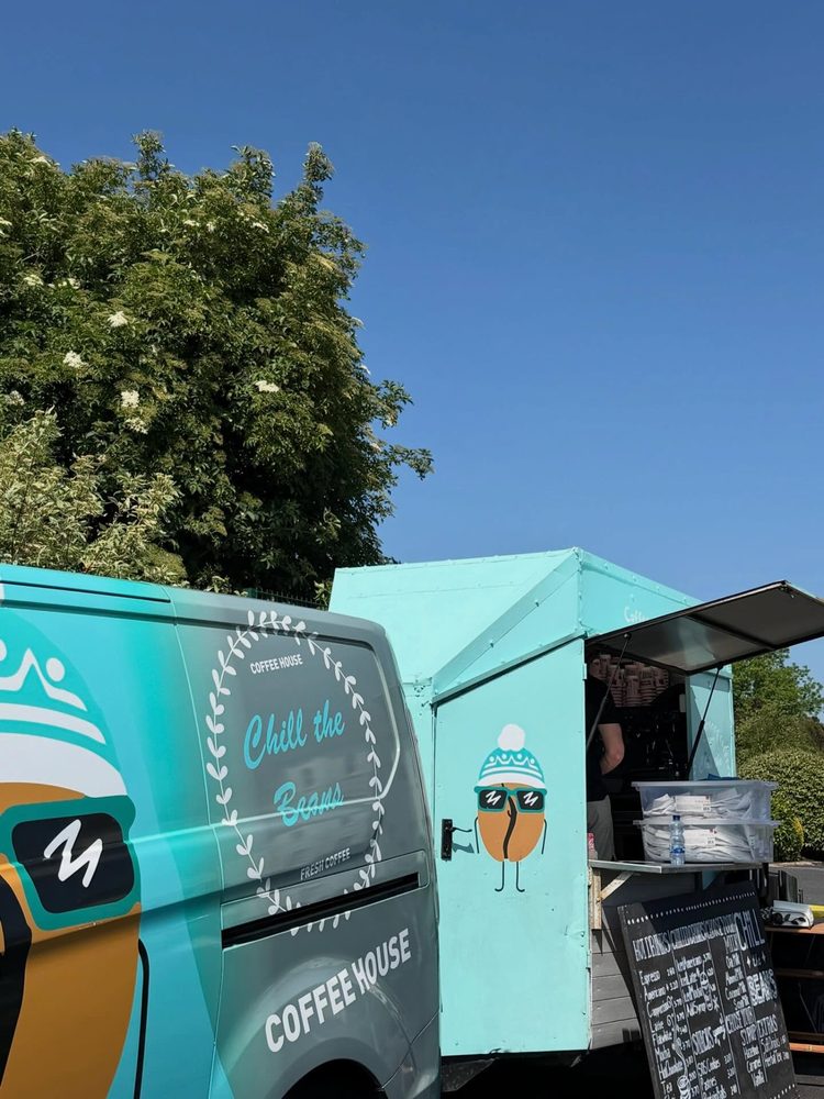 The Chill the Beans coffee van parked under a blue sky